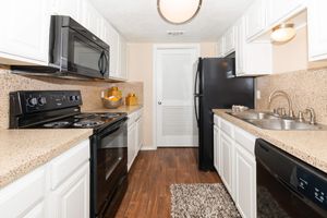 kitchen with white cabinets