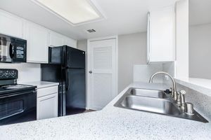 a kitchen with a closed door
