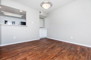 vacant dining room with wooden floors