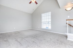 vacant loft with carpet