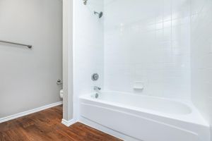 shower tub with white tile