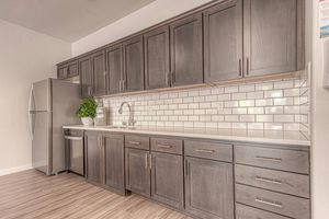 Community kitchen with wooden cabinets