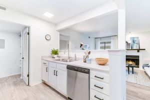 Kitchen with white cabinets and modern sink at Rainbow Ridge Apartments in Kansas City, Kansas