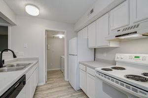 Updated white cabinets at Rainbow Ridge Apartments in Kansas City, Kansas