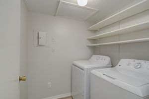 Walk-in pantry with washer and dryer at Rainbow Ridge Apartments in Kansas City, Kansas