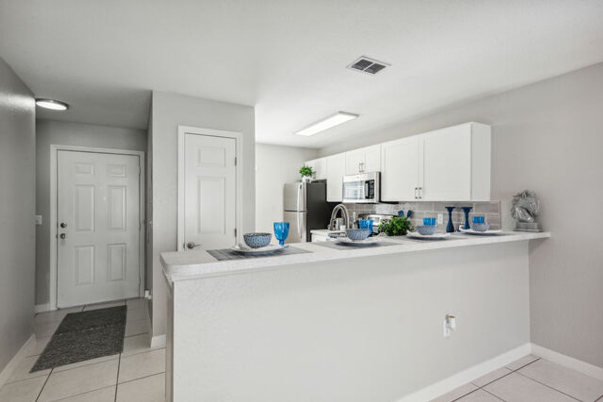 White Cabinet with White Tile
