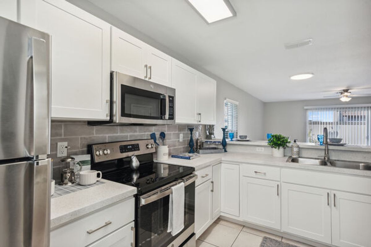 White Cabinet with White Tile