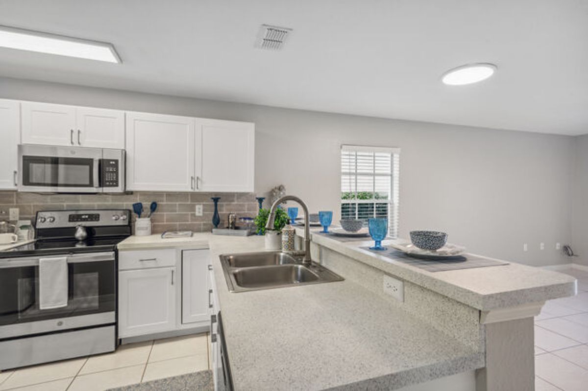 White Cabinet with White Tile