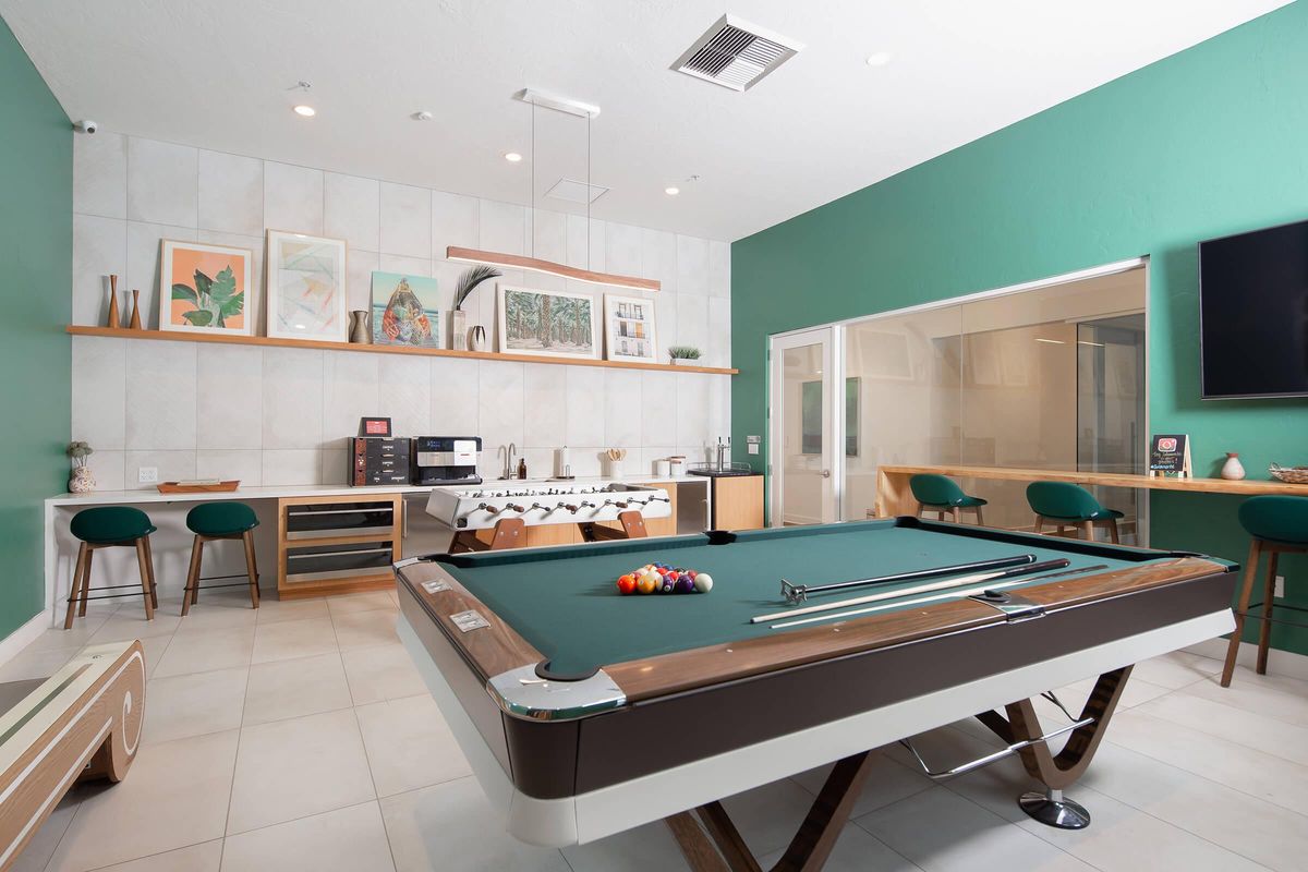Community room with a pool table