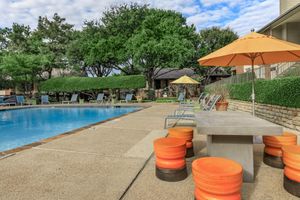 Oak Chase community pool with orange chairs