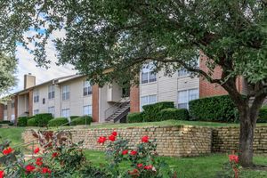 community building with red flowers