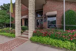 Oak Chase leasing office with green plants