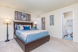 a bedroom with carpet