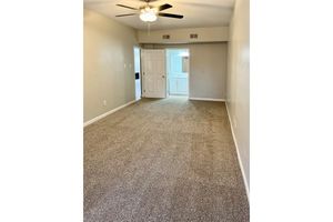 PLUSH CARPETING AND HIGH CEILINGS