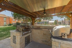 stainless steel barbecues under a pavilion