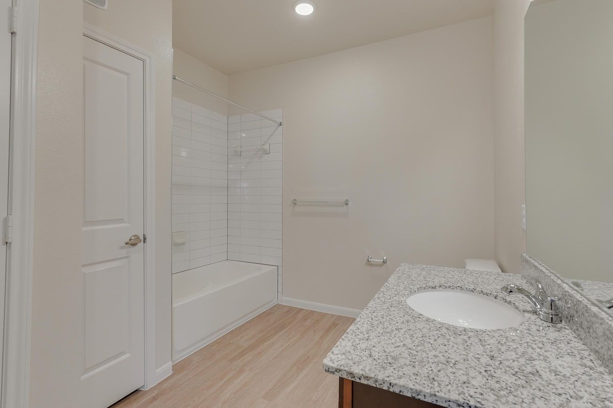 Pflugerville TX Apartments for Rent - Legacy Ranch at Dessau East Large Bathroom with Stainless Steel Fixtures, Extra Storage Space, and Much More