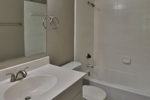 bathroom with white countertops