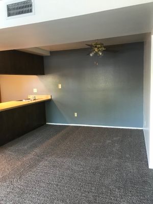 Vacant carpeted dining room