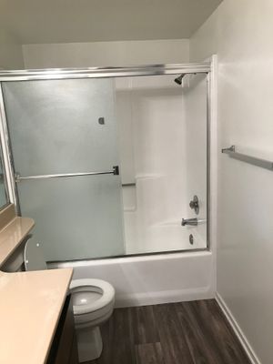Vacant bathroom with sliding glass doors