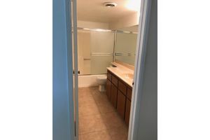 Bathroom with linoleum flooring