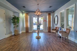Jasmine Parke Apartments entrance are with wooden floors