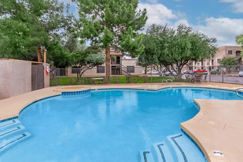 Pool and poolside area at Crystal Pointe Apartments.
