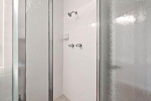 a shower stall in a room
