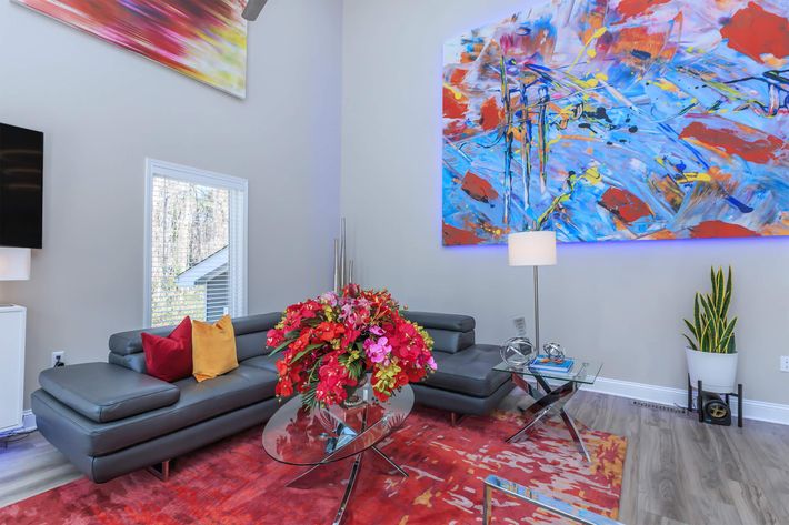 a living room filled with colorful flowers