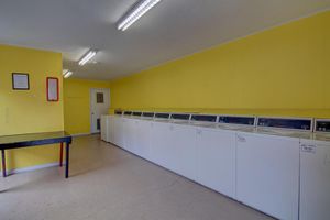 a large empty room with yellow walls