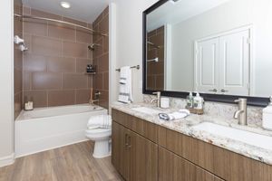 unfurnished bathroom with granite countertop