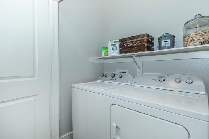 LAUNDRY ROOM WITH FULL SIZE WASHER AND DRYER