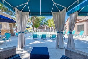 Shimmering Swimming Pools with Fully furnished deck - Coral Point Apartments - Mesa, Arizona