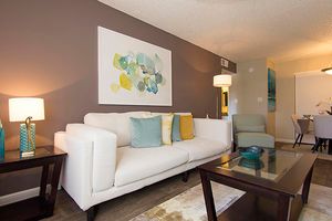 Updated Living room with Accent Wall - Coral Point Apartments - Mesa - Arizona