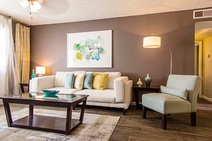 Updated Living room with Accent Wall - Coral Point Apartments - Mesa - Arizona