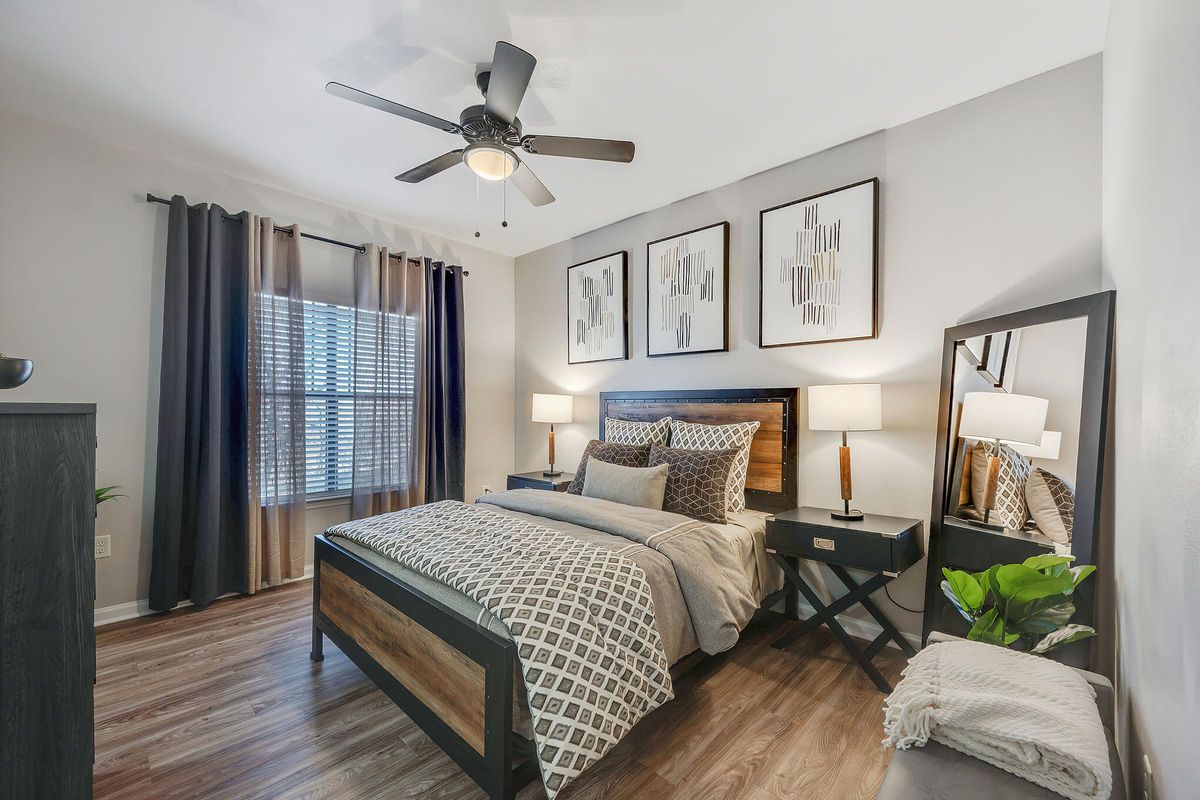 Bedroom With Ceiling Fans