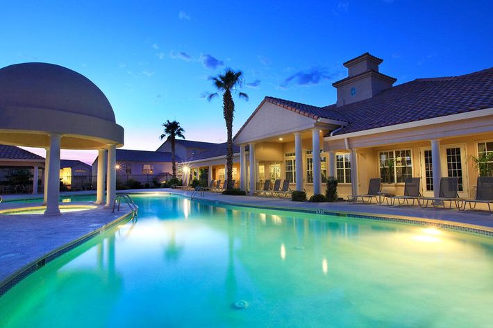 TAKE A DIP IN THE RESORT-STYLE SWIMMING POOL 