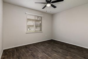 Bedroom with Wood-Style Flooring - The Gallery Apartments - Tempe - Arizona