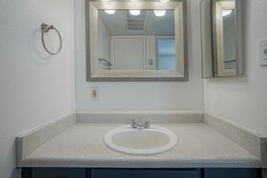 Dark grey bathroom vanity at Treehouse Apartments in Albuquerque, New Mexico