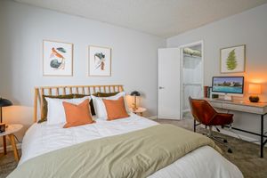 Furnished platinum bedroom interior with workspace at Treehouse in Albuquerque, New Mexico