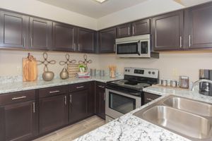 a modern kitchen with stainless steel appliances