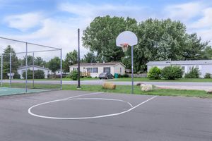 a basketball in a parking lot