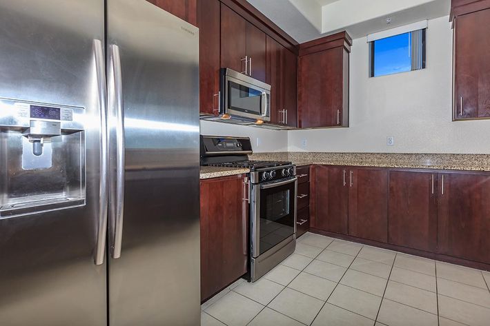 STAINLESS STEEL APPLIANCES AND UPGRADED CABINETS AT ECHELON AT CENTENNIAL HILLS IN LAS VEGAS