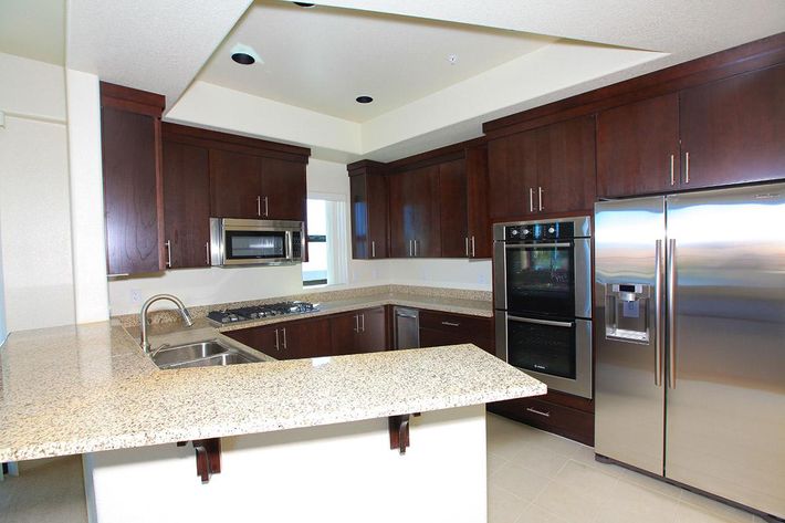 ECHELON AT CENTENNIAL HILLS IN LAS VEGAS HAS GRANITE COUNTERTOPS AND STAINLESS STEEL APPLIANCES