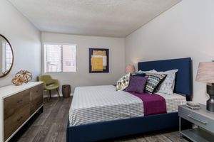 Bedroom with Wood-Style Flooring - Eden Apartments - Tempe - Arizona