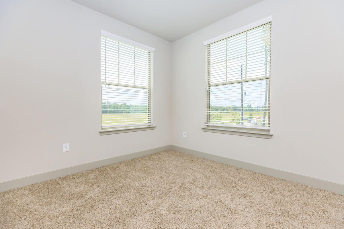 Plush carpeting in the bedrooms at Ariza Gosling in Spring, TX