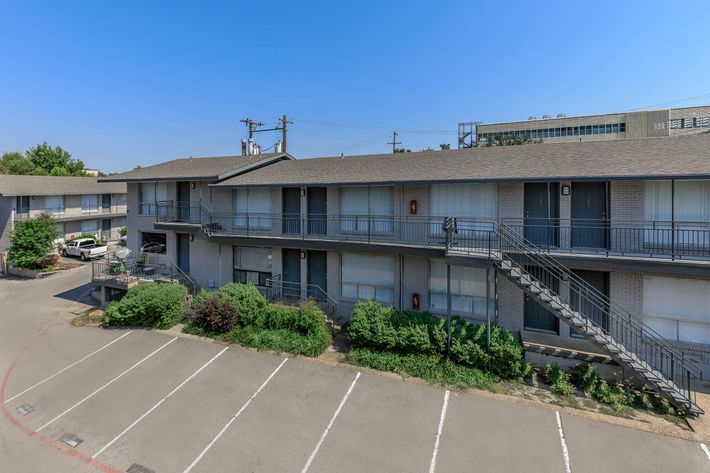 a small house in a parking lot