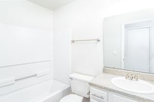 Bathroom with vanity at Huntsview Apartments in Greensboro, North Carolina