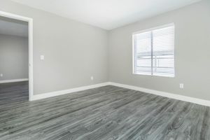 Clean spacious bedroom floor plan with large window