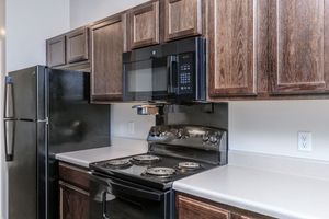 ALL-ELECTRIC KITCHEN WITH BLACK APPLIANCES