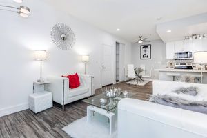 a room filled with furniture and a sink